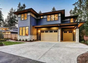 Maison-cottage-exterieur-bleu-brun-garage-double-integre